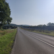The road that runs parallel to that final straight. Visible on the right